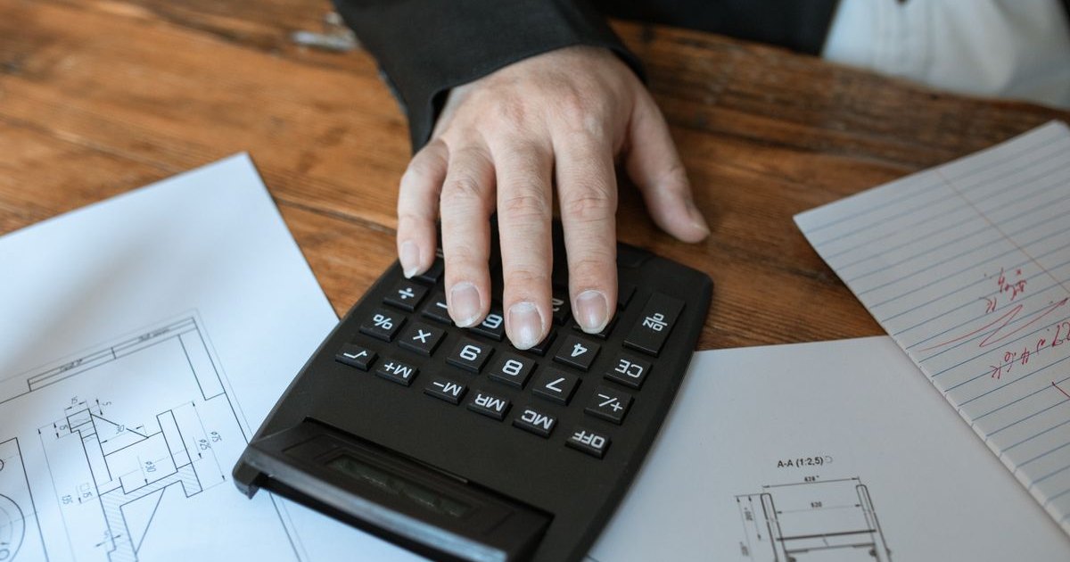 Financial planning paperwork and a calculator
