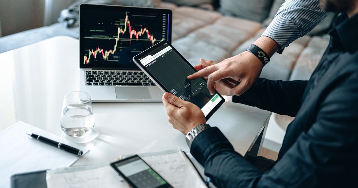 Reviewing finances on a tablet